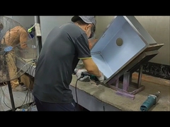 workers doing handmade sink satin finished.